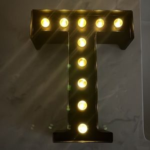 Marquee style light up “T.” Works great!!